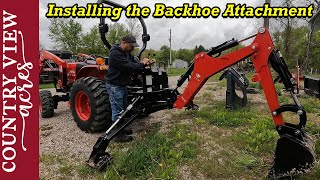 Getting the tractor ready to dig some trench Mounting the Backhoe attachment on the TYM 2515 [upl. by Unity]