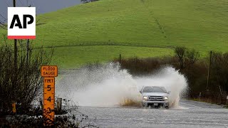 Wet winter storm hits California closing regional airport and trapping people in swollen rivers [upl. by Qooraf]