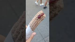 Boysenberry fruit stuffed cinammon covered fresh churro  Knotts Berry Farm California 9142024 [upl. by Talia]