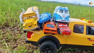 Pickup truck carrying cartoon toy cars trucks police cars fire trucks garbage trucks trucks [upl. by Winnick]