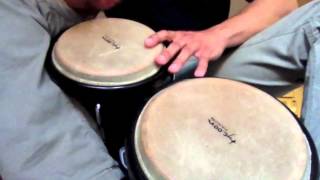 How to play the bongos conga rhythm [upl. by Nemzaj]