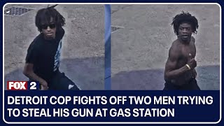 Detroit cop fights off two men trying to steal his gun at gas station [upl. by Nylasor]