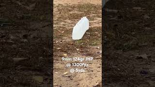 Water jug testing 9mm 124gr JHP from Everglades Ammo 1200fps  5yds [upl. by Ellednahs]