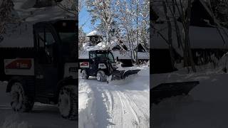 Bobcat toolcat UW56 plowing snow with vblade [upl. by Gittle]