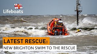 RNLI New Brighton brave rescue swimming to two children cut off by the tide [upl. by Ahseiuqal]