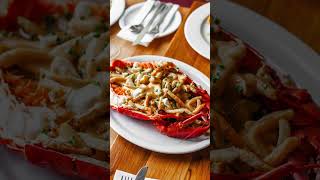 Try our popular lobster poutine a dish featured on Diners DriveIns and Dives with Guy Fieri [upl. by Anelagna]