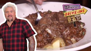 Guy Fieri Eats Irish Guinness Stew in Atlantic Beach  Diners DriveIns and Dives  Food Network [upl. by Aerdnod]