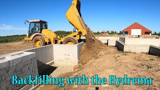 Backfilling Porches With The 912 Hydrema [upl. by Enoek40]