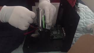 Installing a hard drive using anti static gloves [upl. by Demp]