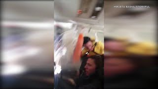 SCARY VIDEO Flight attendant beverage cart smash into ceiling during violent turbulence  ABC7 [upl. by Ecyac443]