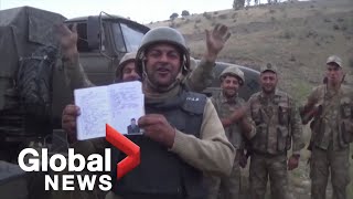 NagornoKarabakh conflict Azerbaijan troops show off alleged destroyed Armenian military hardware [upl. by Airbas]