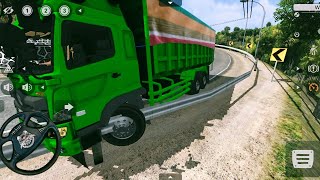 TRUK MUATAN BATU BARA NYANGKUT DI PEMBATAS JALANBUSSID [upl. by Nedmac825]