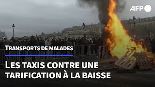 Transport des malades 500 taxis manifestent près de lAssemblée nationale à Paris  AFP Images [upl. by Iosep]