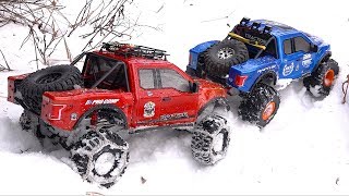 RED amp BLUE Ford F150 RAPTORS  SNOW at the CREEK 18 scale Cragsman  RC ADVENTURES [upl. by Aryamoy]