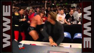 Arnold Schwarzenegger punches Triple H SmackDown [upl. by Lodhia]