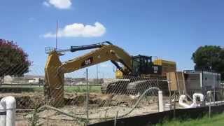 Brand New Caterpillar 390F L Digging A Trench [upl. by Eniamret]