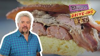 Guy Fieri Eats a Whole Hog Sandwich in Santa Barbara  Diners DriveIns and Dives  Food Network [upl. by Anitsihc]