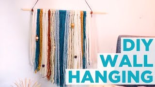 DIY Yarn Wall Hanging  HGTV [upl. by Enitram]