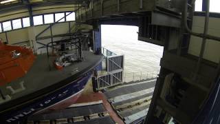 Cromer Lifeboat launching from Cromer Pier Boathouse [upl. by Britt832]