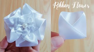 Kanzashi ribbon flower tutorialSatin ribbon craftRibbon flowers easyDiy flower making [upl. by Ewen]