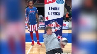 Harlem Globetrotter gets SCHOOLED by a basketball freestyler [upl. by Ybrek]