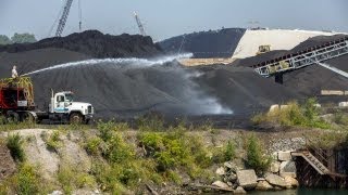 Mounds of pet coke seen along Calumet River [upl. by Corine347]