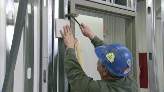 How to Install a Steel Door Frame in Steel Stud Construction  Steel Door Institute [upl. by Akit]