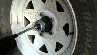 How to Grease Trailer Wheel Bearings with EZ Lube Grease Cert [upl. by Eltsirc]