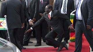 WATCH Robert Mugabe falls down steps in Harare [upl. by Pepe471]