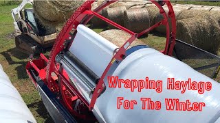 Wrapping Round Bales of Haylage For The Winter  Anderson Hay Wrapper [upl. by Gautious136]