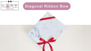 Tying diagonal ribbon bow around gift wrapping box  如何用絲帶绑禮物盒蝴蝶結 [upl. by Alodie570]