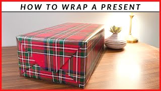 How To Wrap A Present  Simple Wrapping Paper Technique [upl. by Anai]