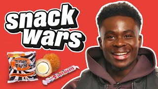 Arsenal Star Bukayo Saka Rates British And Nigerian Food  Snack Wars [upl. by Aramad]