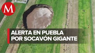 Se forma socavón de 60 metros de diámetro y 20 metros de profundidad en Juan C Bonilla Puebla [upl. by Lamahj]