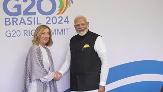 Italian PM Meloni and Indian PM Modi meet in Rio during G20 summit  AFP [upl. by Ahtanaram]