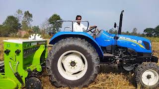 new holland 5510 on super seeder [upl. by Suirtemed]