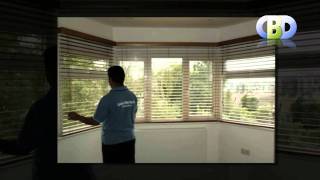 BayWindow Wooden Venetian Blinds at wwwleadinginteriorscom [upl. by Atnicaj]