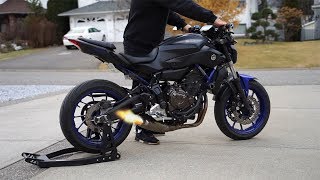 Yamaha MT07 Akrapovic Cold start  Revs  Fly by LOUD [upl. by Enelehs]