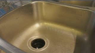 Leaking Kitchen Sink  How to fix clean and seal easy guide [upl. by Eiveneg]