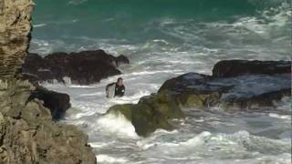 Surfer getting smashed on rocks [upl. by Brena]