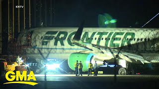 Frontier Airlines jet appears to catch fire during landing [upl. by Klement]