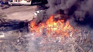 Hillside fire in Californias San Bernardino razes homes [upl. by Stolzer747]