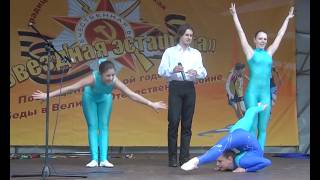 Contortionist performs with two acrobats and singer [upl. by Landmeier384]