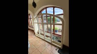 Arched energy efficient windows and an arched double door supply and installation door arched [upl. by Siloa]