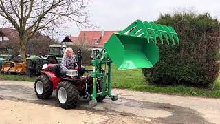 Hecklader  Theilmann Landtechnik GmbH  Carraro mit Heckloader Krokodilgebiss Heckstapler Schaufel [upl. by Tonry]