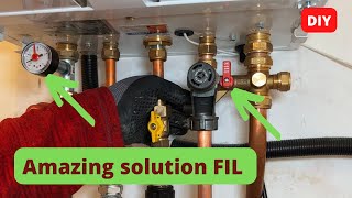 A Plumber shows how to connect a fillinginlet combination to a central heating boiler [upl. by Elita]