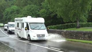 Vehicles Driving Through Flooding A93 Road Perthshire Scotland [upl. by Urbanus662]