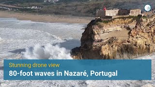 Drone Captures Nazarés 80Foot Wave Spectacle [upl. by Wistrup]