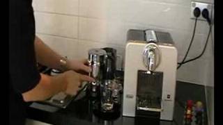 Delonghi Nespresso Coffee Machine Le Cube 185 Demo [upl. by Viridis]