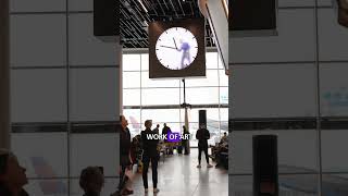 Man in the clock  Amsterdam Airport Schiphol [upl. by Oam291]